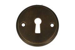 Schlüssel-Rosette rund Messing patiniert. Preis pro Stück